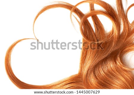 Red hair in shape of heart, isolated on white background