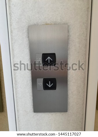 Up and down lift press button