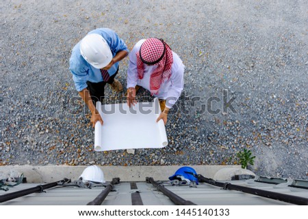 Islamic engineers are looking to print and write to check the completeness of the construction work.