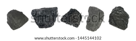 Natural black hard coal or diamond coal isolated on white background. Best grade of metallurgical anthracite coals often referred to as stone coal and black diamond coal Royalty-Free Stock Photo #1445144102