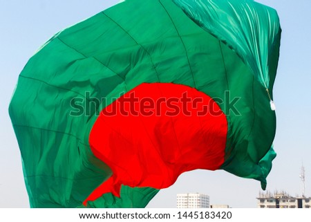 Bangladeshi Flag Waving in sky at Dhaka, Bangladesh.