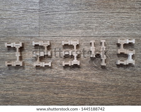 Mobile photography. Horizontal image of numbers from one to five, made up of toy-type wooden blocks lying on the surface of the imitating tree. The ability to use as a rating likes from one to five.