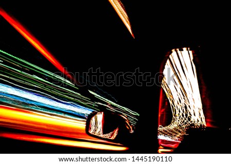 Light trails through a car window - passing by