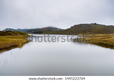 Rodeo Lagoon on the Pacific Ocean coastline, on a cloudy day, Marin Headlands, Marin County, California Royalty-Free Stock Photo #1445223764