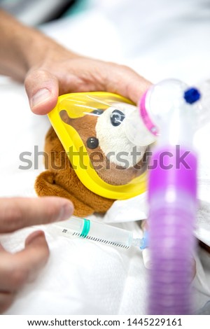 a bear in good hands in a hospital