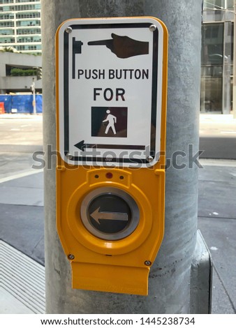 Pedestrian crossing traffic control in California. Push button.