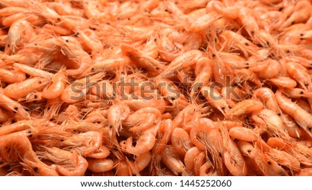 Tasty fresh shrimps as background.