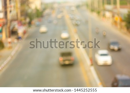 Abstract blur cars on road background.