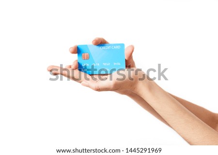 Hand holding business credit isolated on white background