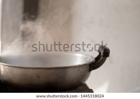 White smoke from cooking in countryside kitchen. Soft picture