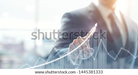 Development and growth concept. Businessman plan growth and increase of positive indicators in his business. Royalty-Free Stock Photo #1445381333