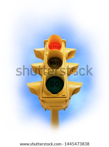 Upward view of  tall vintage yellow traffic signal with red STOP light on white vignette background