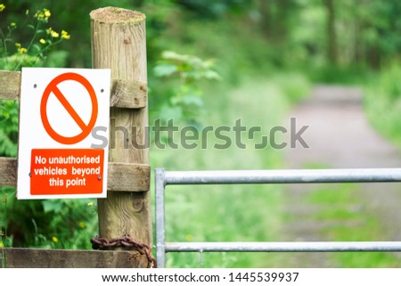 No unauthorised access beyond this point sign at entrance gate