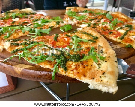 great mixed pizza made presentation on wood board round great image presentation slice pizzas on white porcelain plate alternative composition conceptual shoot cafe bistro pizza photo shoot.