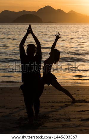 health and wellbeing at sunrise on the edge of copacabana beach in rio de janeiro