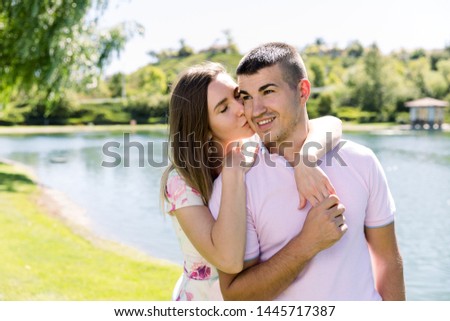 Happy young couple at the park