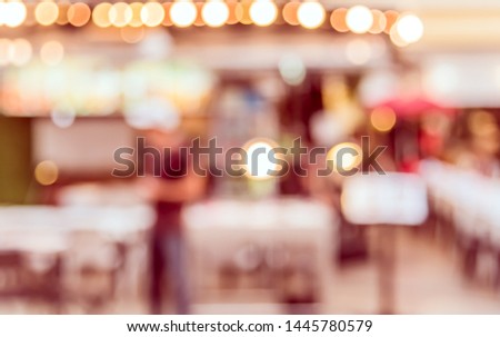 Vintage tone Abstract Blurred image of Street day market  with bokeh for background usage .