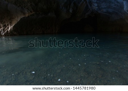 Water at the entrance of the Herb Cave Entrance to Na Kratib Village Or the city of Lae, Laos.