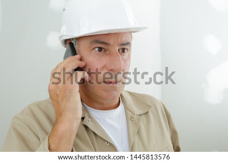 portrait of an engineer talking on the phone