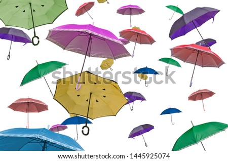 Beautiful colored umbrellas on white background