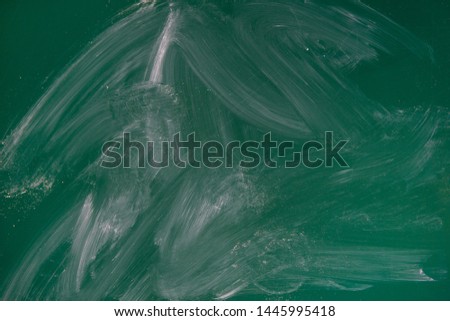 Green school board with chalk divorces. Green background. Copy space.