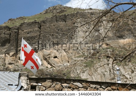 in georgia the waving blurred flag in the sky
