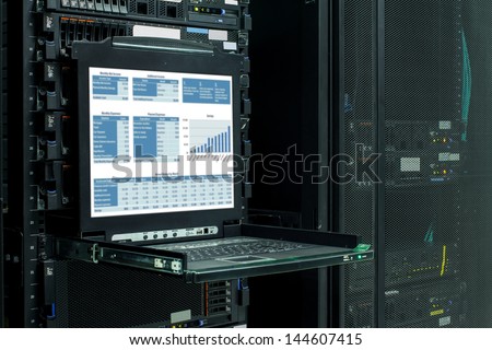 financial information show on the server computer display. Royalty-Free Stock Photo #144607415