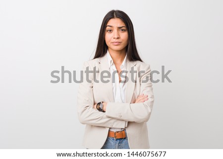 Young business arab woman isolated against a white background unhappy looking in camera with sarcastic expression. Royalty-Free Stock Photo #1446075677