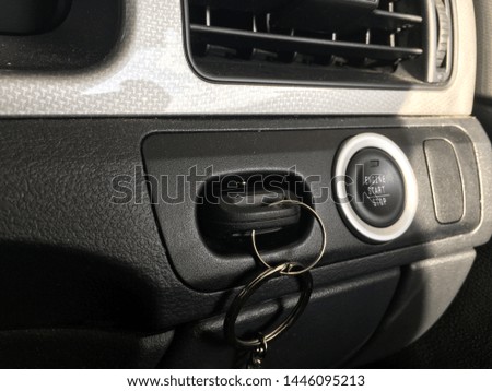 Car start up ignition button with key 