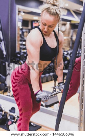 Young woman workout in gym. Healthy lifestyle. selective focus. Motion Blur