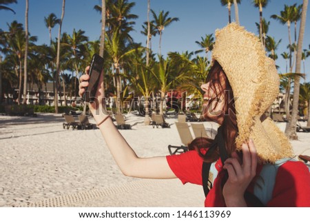   traveler woman in hat on the beach summer                             