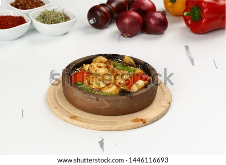 Shrimps with vegetables in casserole stew