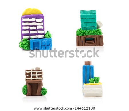 Clay sculpture building isolated on the white background.