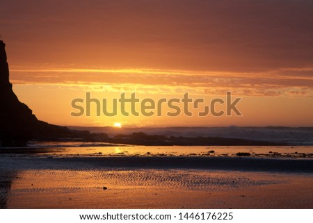 sunset at the beach with a beautiful panoramic