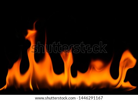 The flame is burning on a black background - image