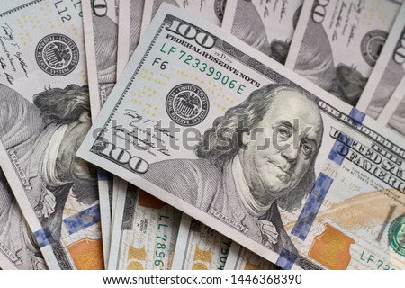 one hundred dollars dinero money dolars cash flow Royalty-Free Stock Photo #1446368390