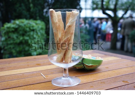 Cocktail and bread sticks toothpick and table Royalty-Free Stock Photo #1446409703