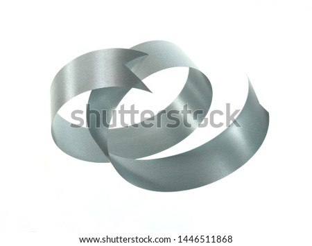 Silver ribbon roll isolated on white background