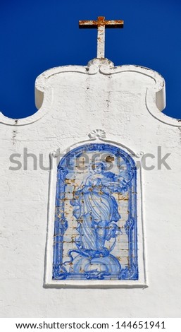 The religious painting of the tiles-called azulejos in Monsaraz.