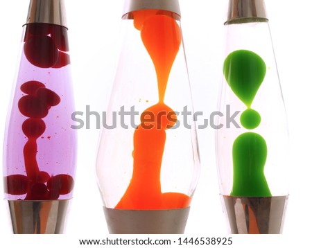 Colourful lava lamps next to and behind each other