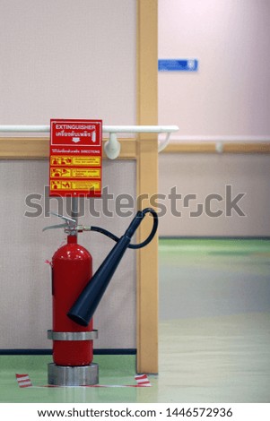 Handheld fire extinguisher with stand and convenience to use