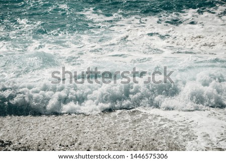 View of the troubled sea. Surf. Nature and windy weather.
