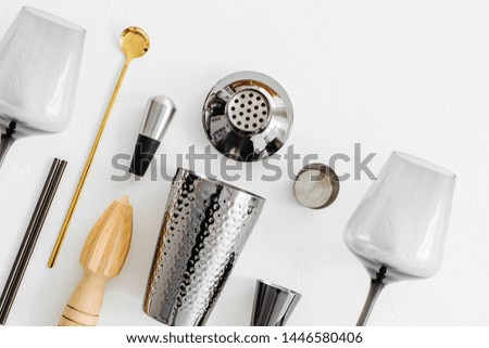 Bar accessories and tools for making cocktail. Shaker, jigger, glass, spoon  and  other bar tools.