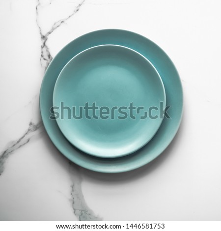 Turquoise empty plate on marble, flatlay - stylish tableware, table decor and food menu concept. Serve the perfect dish