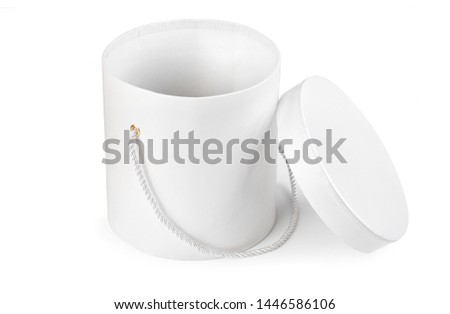 White cardboard gift round box with closed lid with shadow isolated on white background
