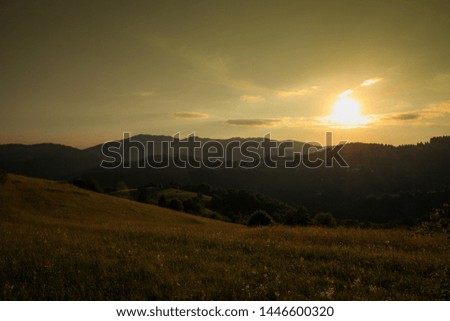 summer landscape nature in sunset in mountains and hills on countryside.-Image