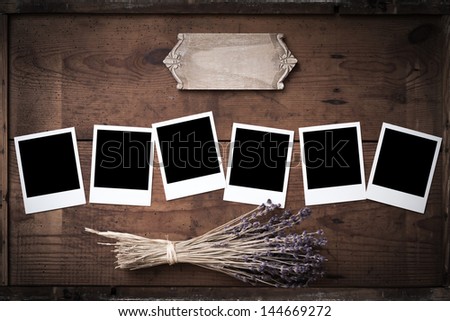 photo frame on wood with lavender and sign