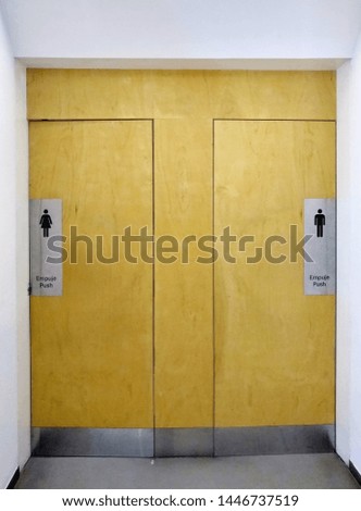 Male and female: two bathroom doors