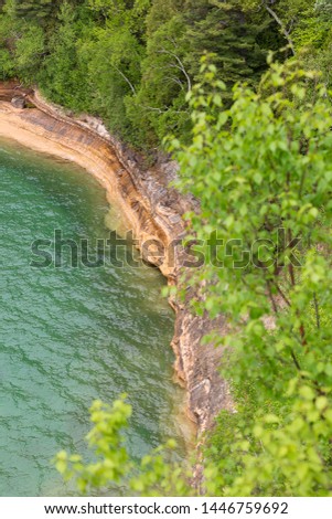 Turquoise water below the cliffs  at Miners Castle  Pictured Rocks National Lakeshore coastline of Michigan upper peninsula