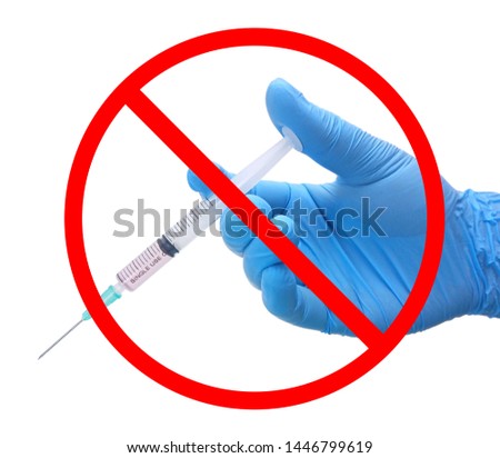 No vaccination sign, vaccines products in syringe instrument on the hand of doctor in blue medical glove isolated on white background, Anti-vaxxers concept